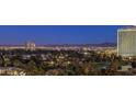 Scenic nighttime aerial view of city lights and a golf course at 322 Karen Ave # 1001, Las Vegas, NV 89109