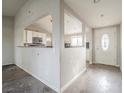 Kitchen area with white cabinets and granite countertops at 3644 San Pascual Ave, Las Vegas, NV 89115