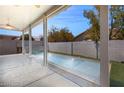 Relaxing pool area with covered patio and plenty of space for entertaining at 3940 Colonial Field Ave, North Las Vegas, NV 89031