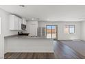 Modern kitchen featuring stainless steel appliances and a breakfast bar at 6270 Blood Lily Ave, Las Vegas, NV 89122