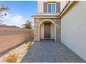 Front entry with stonework and a paved walkway at 3957 Little Creek Ave, Las Vegas, NV 89141