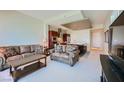 Spacious living room with kitchen view and comfy seating at 4471 Dean Martin Dr # 1002, Las Vegas, NV 89103