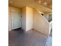 Building entryway with a security door and stairs at 3761 Desert Marina Dr # 81, Laughlin, NV 89029