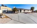 Home with detached workshop and large driveway at 4428 Thicket Ave, North Las Vegas, NV 89031