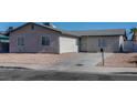 Newly remodeled home with a long driveway at 4470 Peterson Dr, Las Vegas, NV 89103