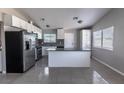 Updated kitchen featuring stainless steel appliances and an island at 4470 Peterson Dr, Las Vegas, NV 89103