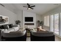 Bright living room with fireplace and plant accents at 2856 Billy Casper Dr, Las Vegas, NV 89134