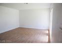 Bright living room featuring tile floors and large windows at 3937 S Torrey Pines Dr, Las Vegas, NV 89103