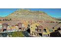 Aerial view of townhouses with mountain backdrop at 3975 N Hualapai Way # 293, Las Vegas, NV 89129