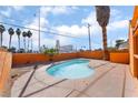 Relaxing kidney-shaped pool in a sunny backyard at 5453 Requa Ave, Las Vegas, NV 89110