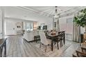 Bright dining area with a large table, perfect for Gathering meals at 6456 Grande River Ct, Las Vegas, NV 89139