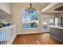 Bright dining room with hardwood floors and chandelier at 8896 Dove Cove Dr, Las Vegas, NV 89129