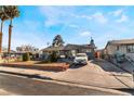 House exterior with a car parked in the driveway at 1920 Wendell Ave, Las Vegas, NV 89101