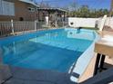 Inviting rectangular pool with surrounding patio at 3712 San Joaquin Ave, Las Vegas, NV 89102