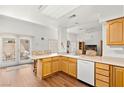 Spacious kitchen with light wood cabinets and stainless steel appliances at 5112 Palm View Dr, Las Vegas, NV 89130