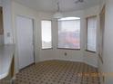 Bright dining area with bay window and tile flooring at 6617 Old Newbury Ave, Las Vegas, NV 89108