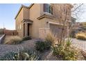 Landscaped front yard with gravel and drought-tolerant plants at 7122 Rocket Launch St, North Las Vegas, NV 89084