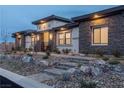 Stunning curb appeal with stone facade and landscape at 9525 Ponderay Ct, Las Vegas, NV 89149