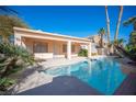 Inviting swimming pool with a spa and covered patio at 10009 Dusty Winds Ave, Las Vegas, NV 89117