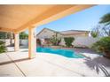 Relaxing pool area with a covered patio at 10009 Dusty Winds Ave, Las Vegas, NV 89117