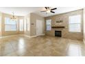 Spacious living room featuring a fireplace and tile flooring at 10550 W Alexander Rd # 1156, Las Vegas, NV 89129