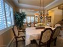 Elegant dining room featuring a formal table and chairs at 2321 Martinique Ave, Henderson, NV 89044