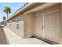 Tan colored front door and walkway to home at 3028 Gannon Ridge Ave, North Las Vegas, NV 89081