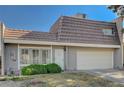 Tan colored house with a brown roof and attached garage at 3642 Haverhill St, Las Vegas, NV 89121