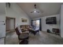 Spacious living room with leather furniture and large TV at 3791 Desert Marina Dr # 118, Laughlin, NV 89029