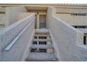 Exterior condo stairs leading to entrance 118 at 3791 Desert Marina Dr # 118, Laughlin, NV 89029