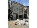 Exterior view of a new home under construction with scaffolding showing the framing at 1521 Bat Hawk St, Las Vegas, NV 89138