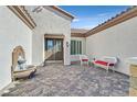 Charming courtyard with fountain and seating area at 2050 Cambridge Springs Dr, Henderson, NV 89052