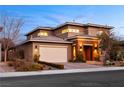 Two-story home with a modern design and attached garage at 2130 Maderno St, Henderson, NV 89044