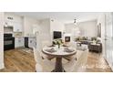 Bright dining area with four chairs and a modern table at 3400 Cabana Dr # 1108, Las Vegas, NV 89122