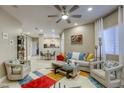 Spacious living room with colorful rug and seating at 5250 S Rainbow Blvd # 2032, Las Vegas, NV 89118