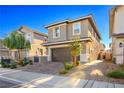 Two-story house with a two-car garage and landscaped front yard at 707 Cottonwood Hill Pl, Henderson, NV 89011