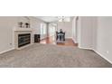 Bright living room featuring a fireplace and hardwood floors at 7132 Junction Village Ave, Las Vegas, NV 89129