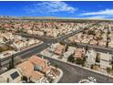 Aerial view of a residential neighborhood with houses and streets at 8101 Spur Ct, Las Vegas, NV 89145