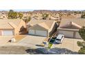 Two-car garage home in a community setting at 861 Zinnia Cir, Henderson, NV 89015