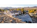 Two-story house with a large yard and mountain views at 1400 San Felipe Ct, Boulder City, NV 89005