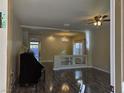 Spacious living room with hardwood floors and high ceilings at 6538 Creekside Cellars Ct, Las Vegas, NV 89139