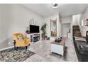 Living room with fireplace and comfortable seating at 1992 Star Creek Bay Ln, Las Vegas, NV 89115