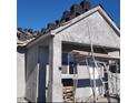 Image of the exterior stucco and stacked roofing tiles of a home under construction at 380 Erin St, Pahrump, NV 89048