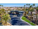 Gated community entrance with palm trees and city views at 4654 Stuttgart St, Las Vegas, NV 89147