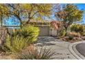 House exterior showcasing a driveway and landscaping at 5744 Serenity Haven St, North Las Vegas, NV 89081