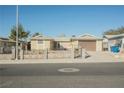 Single-story house with attached garage and fenced yard at 6770 Laronda Ln, Las Vegas, NV 89156