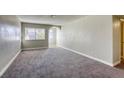 Spacious bedroom with neutral walls and carpet flooring at 6812 Greydawn Dr, Las Vegas, NV 89108