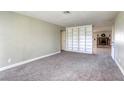 Living room with built-in shelving and fireplace at 6812 Greydawn Dr, Las Vegas, NV 89108