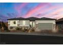 Beautiful single-story home with landscaping and a two-car garage at 9820 Maiden Pink Ave, Las Vegas, NV 89149