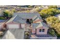 Single-story home, two-car garage, and a large backyard at 2039 Colvin Run Dr, Henderson, NV 89052